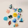 Coco Village Set of 12 Holiday Charms Pin